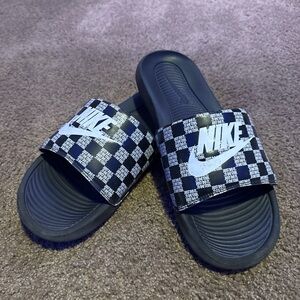 Black and white Nike checkered slides. Size 13.